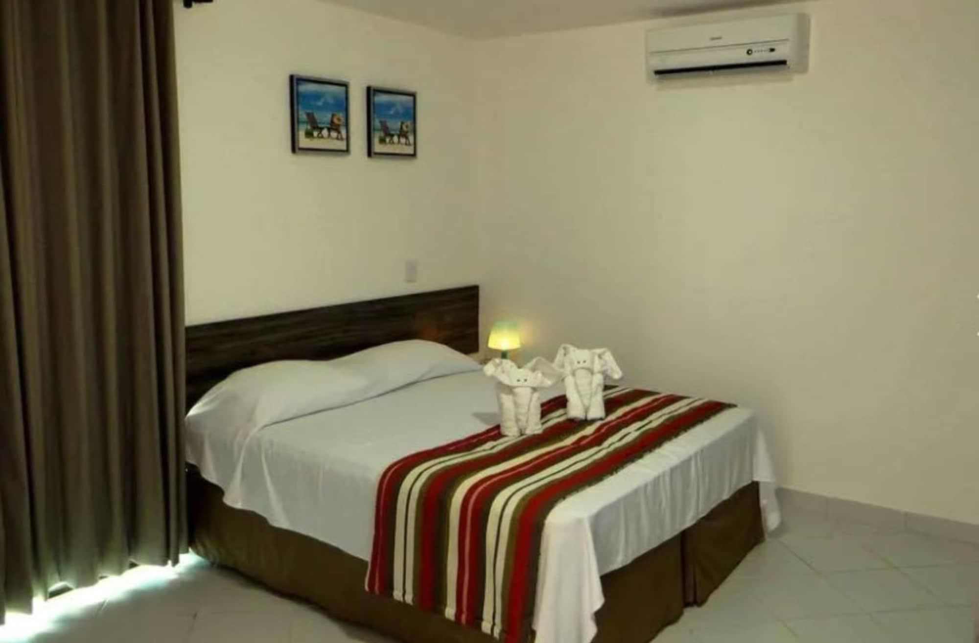 Hotel Enseada Dos Corais กาโป เด ซันโตอากอสตีโญ ภายนอก รูปภาพ